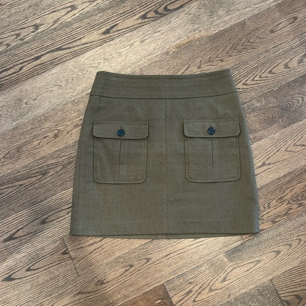 Dark green cargo style mini skirt